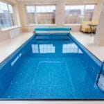 4 Clever & Essential Upgrades for Your Indoor Swimming Pool